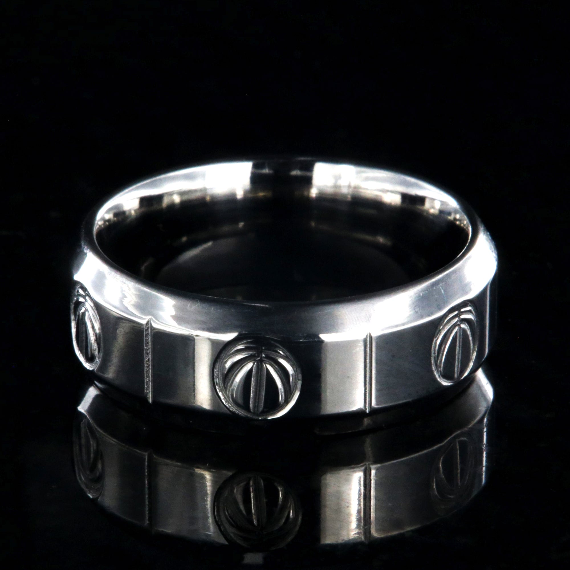 8mm wide titanium basketball ring with beveled edges, milled basketball design, and vertical grooves