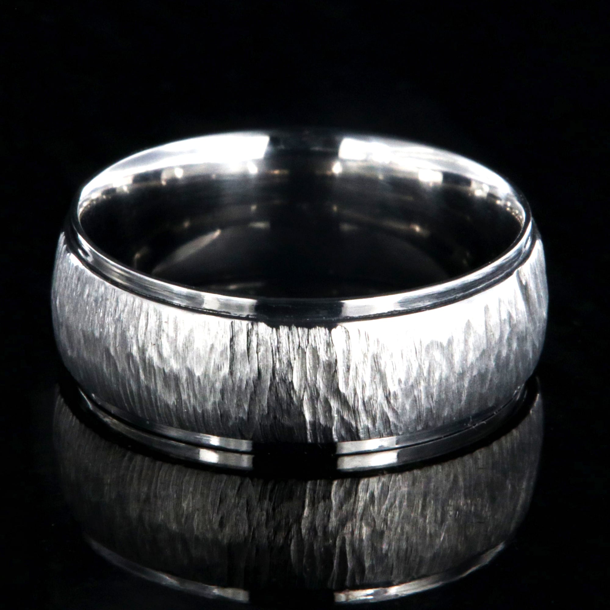 8mm wide titanium wedding band with a raised center and tree bark finish