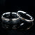 8mm and 4mm wide matching Damascus steel wedding bands with ultra-thin off-centered rose gold inlays