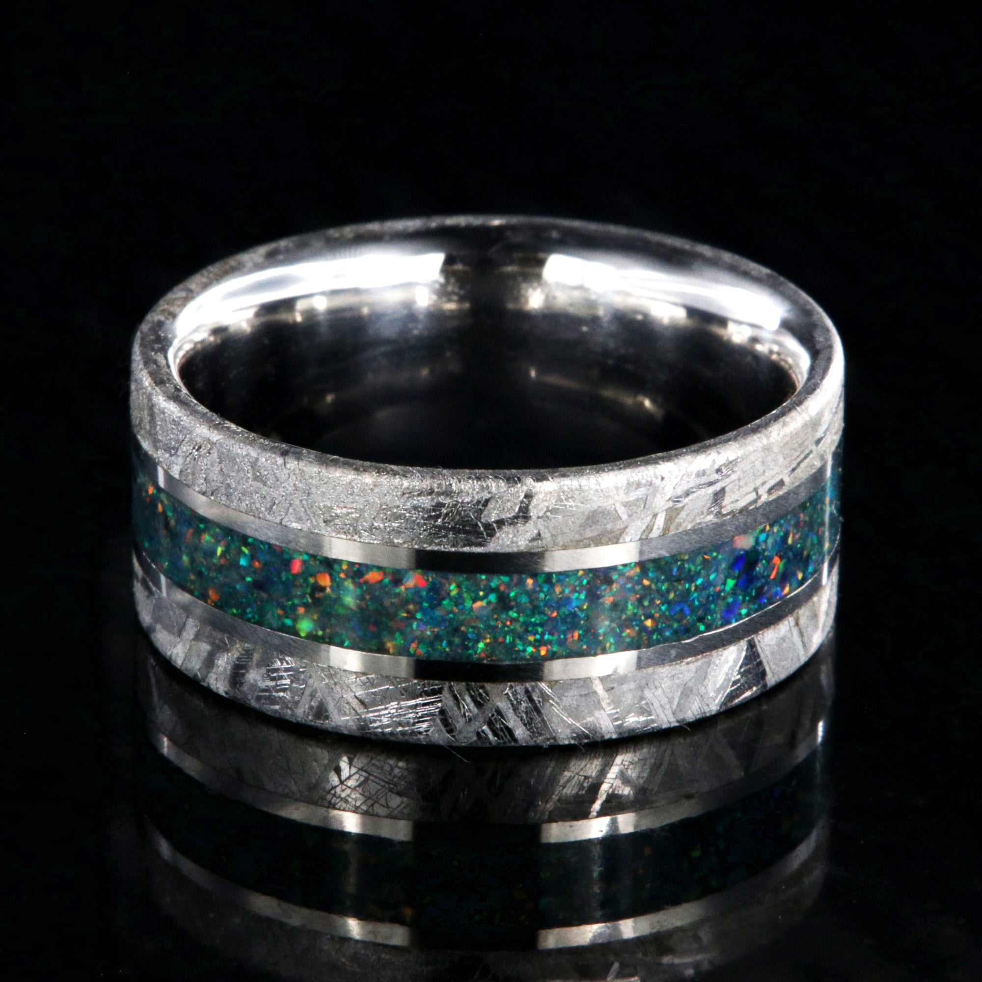 10mm wide cobalt men's wedding ring with Gibeon meteorite edges and a glacial opal inlay