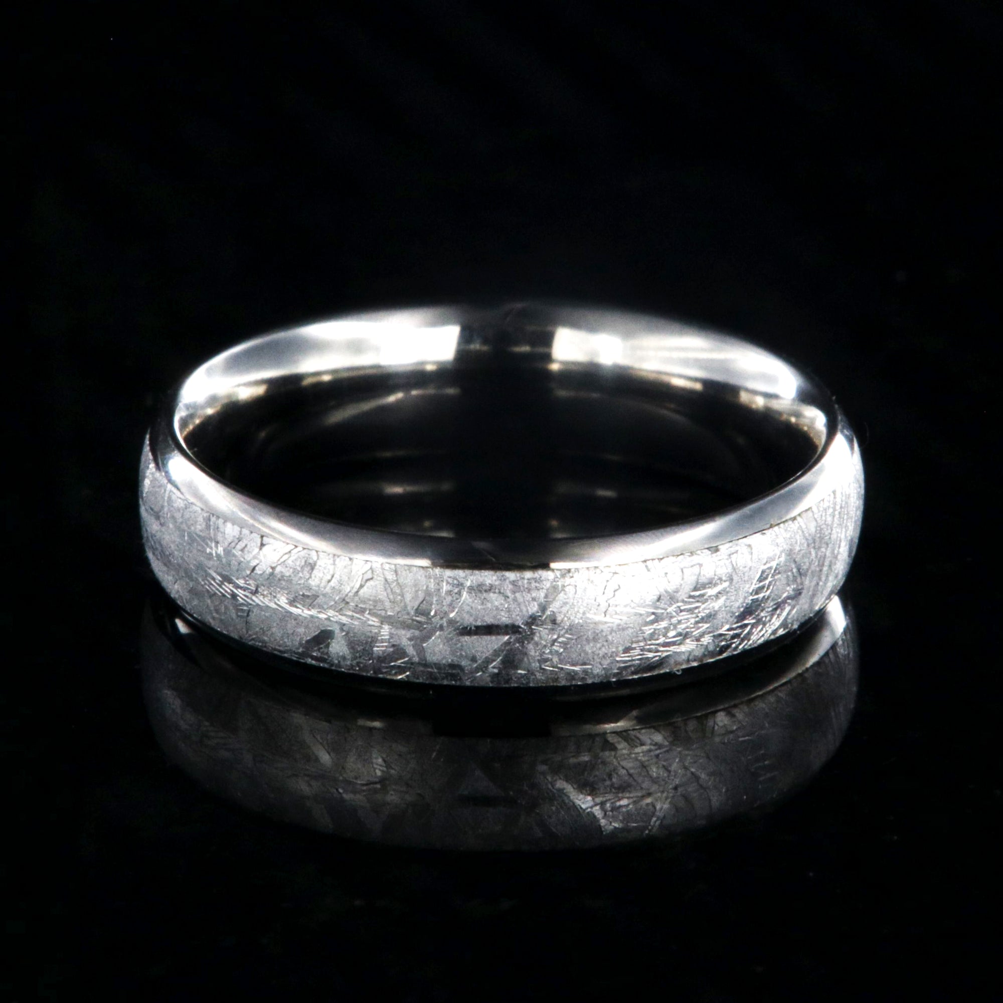 6mm wide meteorite ring with rounded profile and titanium edges and sleeve