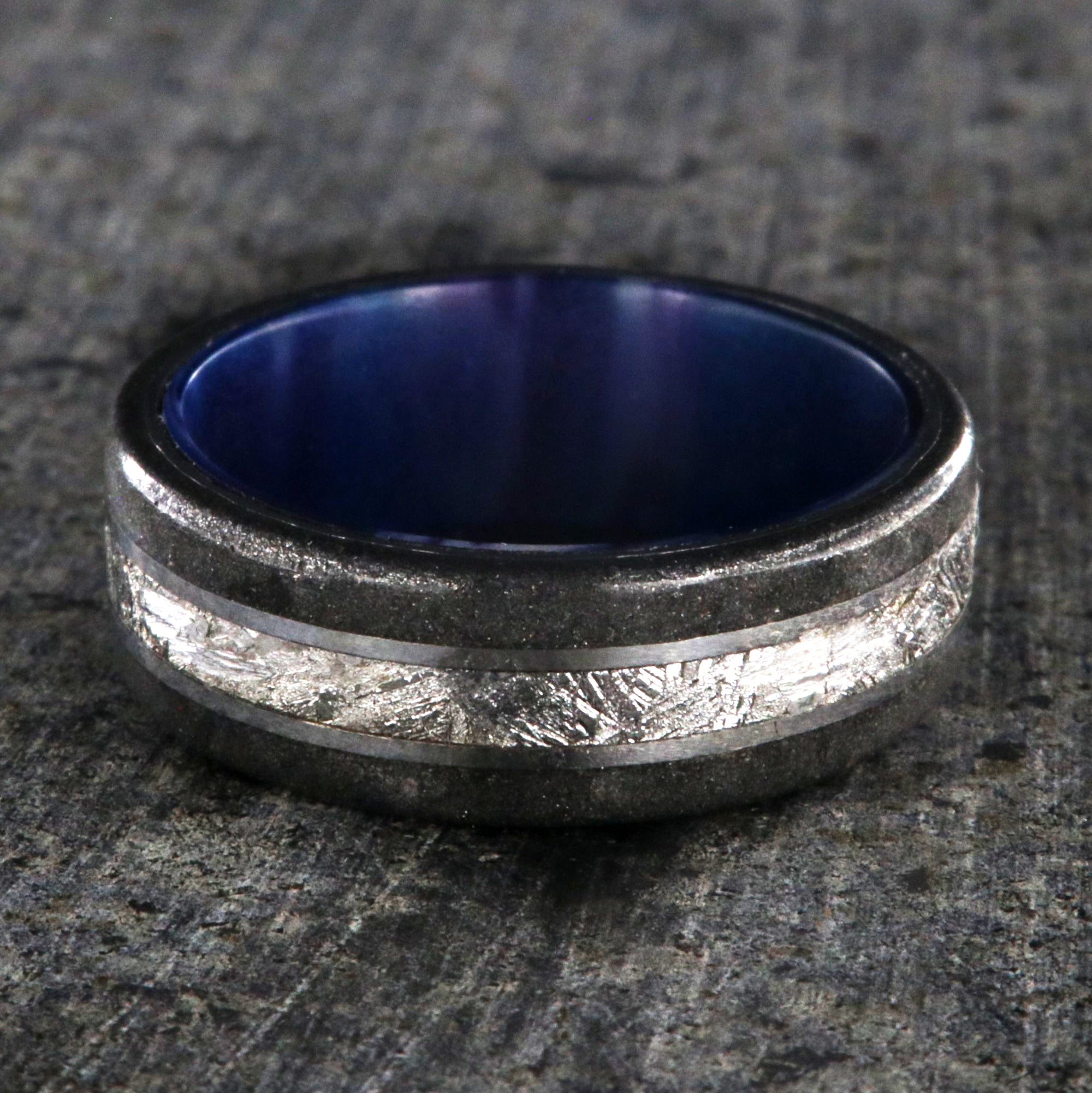 8mm wide meteorite and stardust ring with purple-blue sleeve