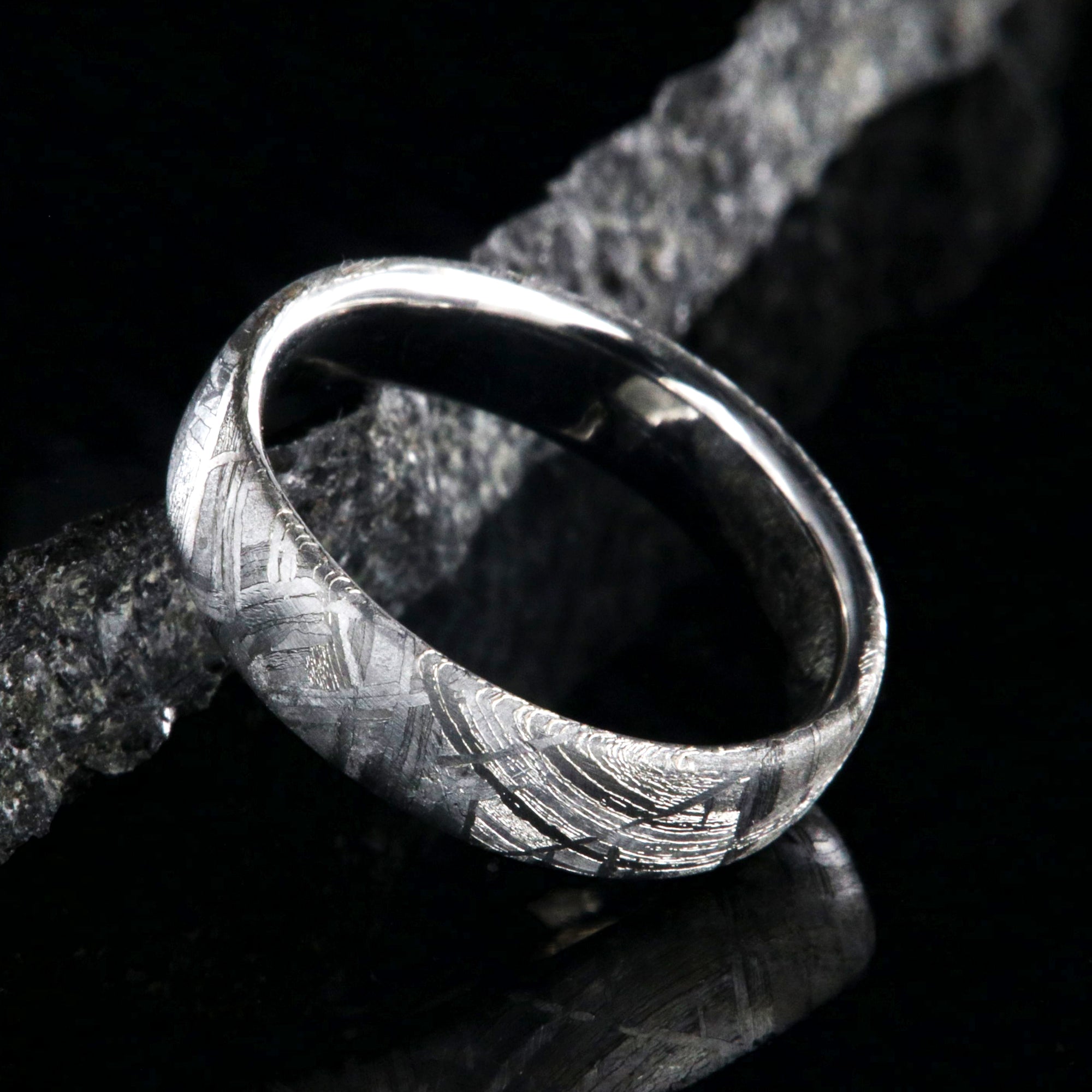 6mm wide meteorite ring made with Muonionalusta meteorite and a polished cobalt sleeve