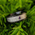 7mm wide meteorite ring with a 3mm purple amethyst stone and black zirconium edges and sleeve