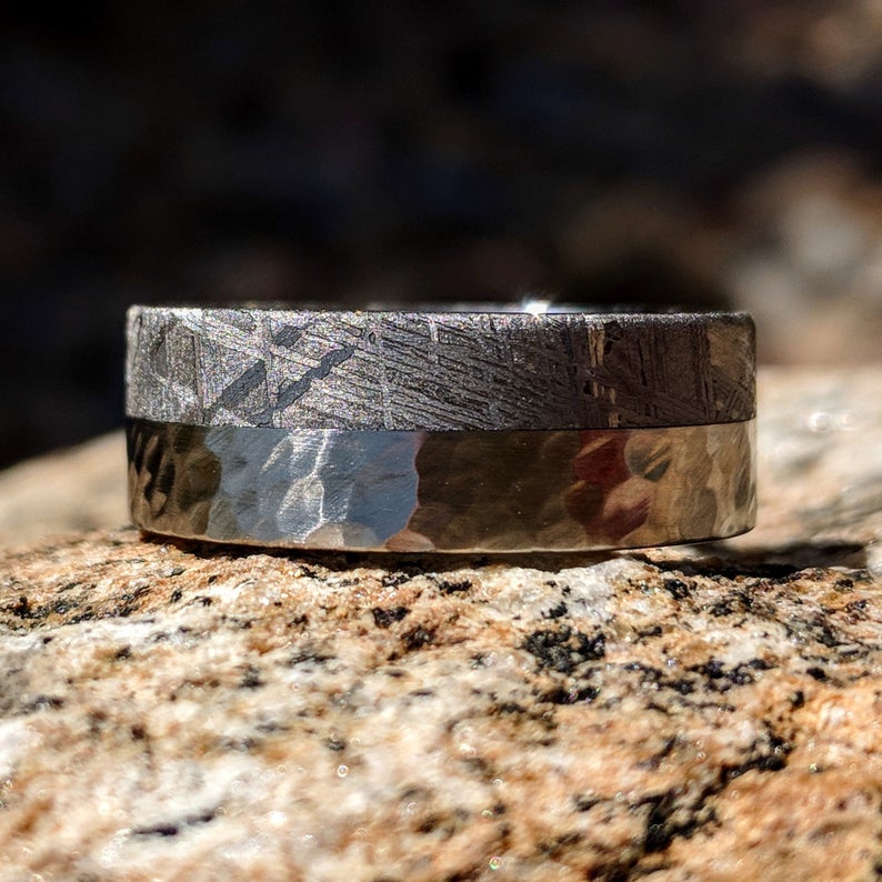 8mm wide cobalt and meteorite wedding ring with half the band covered in meteorite and the other half with hammered polished cobalt