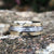 8mm wide cobalt wedding band with a Gibeon meteorite center inlay and off-white abalone shell edges