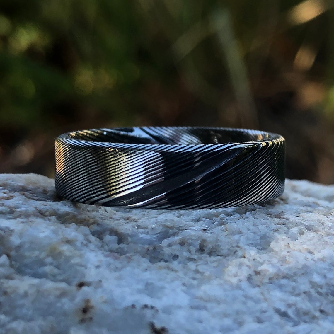 6mm wide Damascus steel wedding band with a flat profile