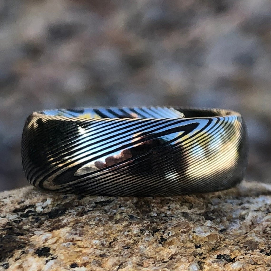 8mm wide Damascus steel wedding band with a rounded profile