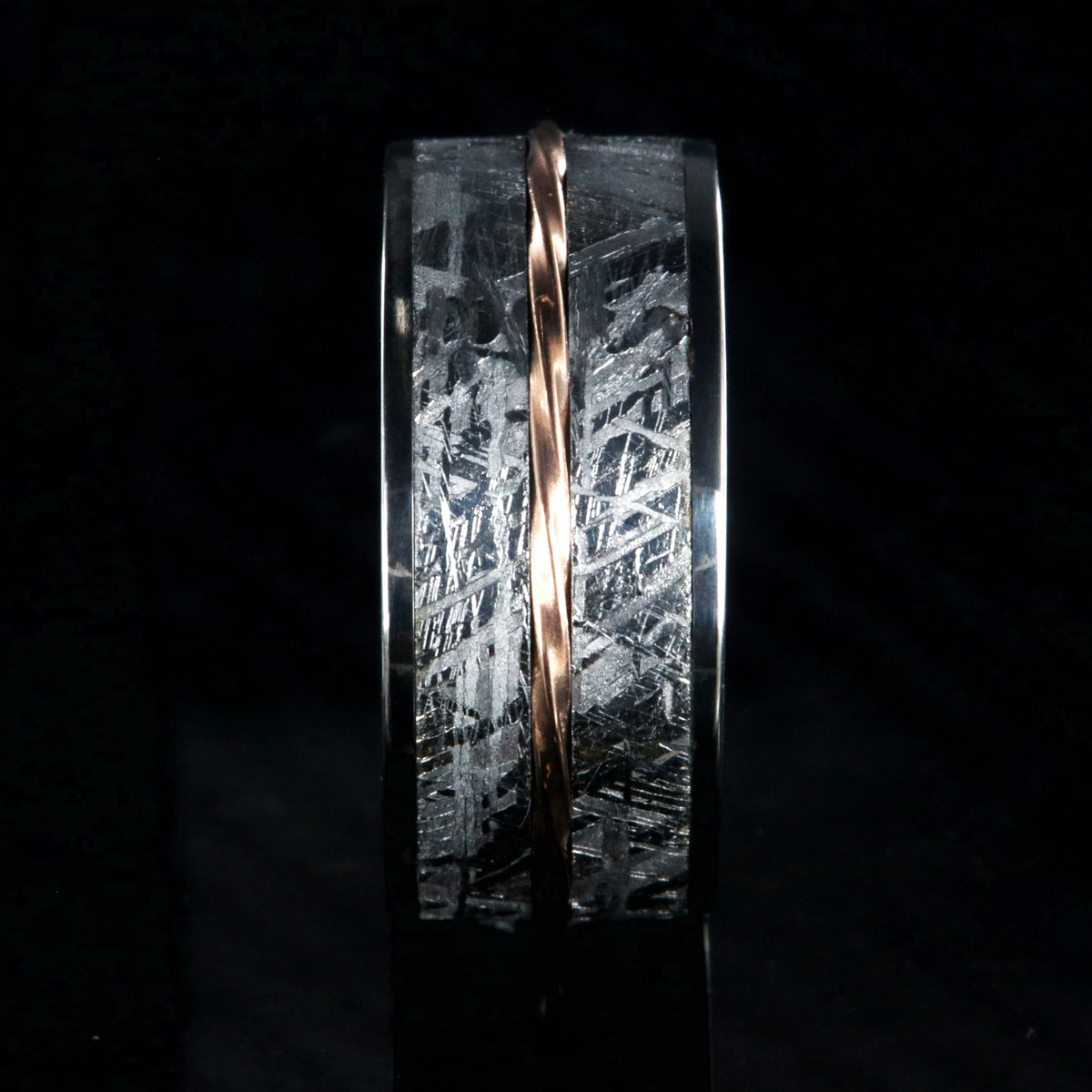 10mm wide titanium ring with Gibeon meteorite and a twisted rose gold center inlay
