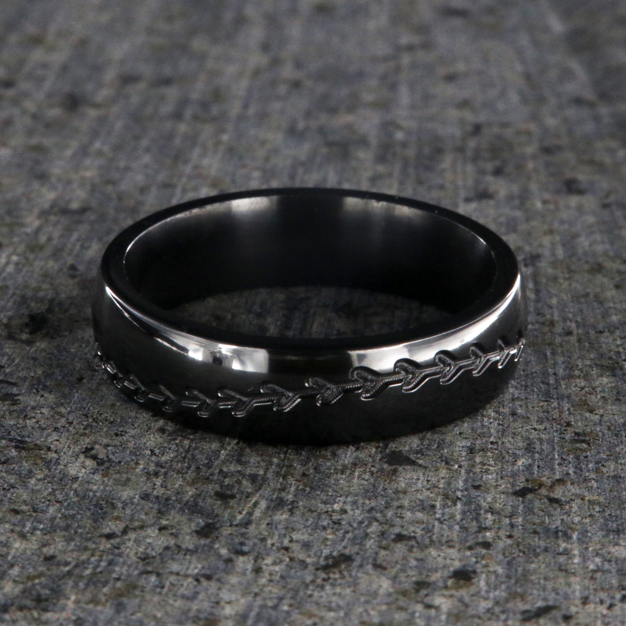 6mm wide black zirconium baseball ring with milled baseball stitching