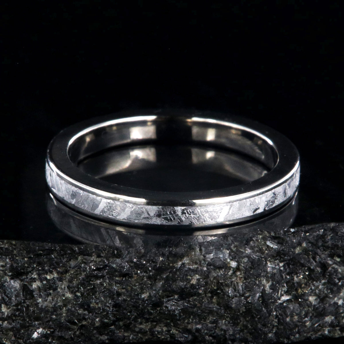 3mm wide women&#39;s meteorite wedding band with titanium edges and sleeve