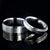 6mm and 4mm wide matching titanium wedding bands with raised centers