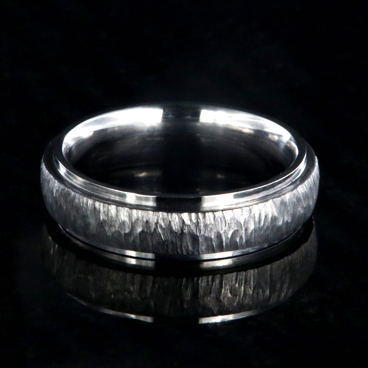 5mm wide titanium wedding band with a raised center and tree bark finish