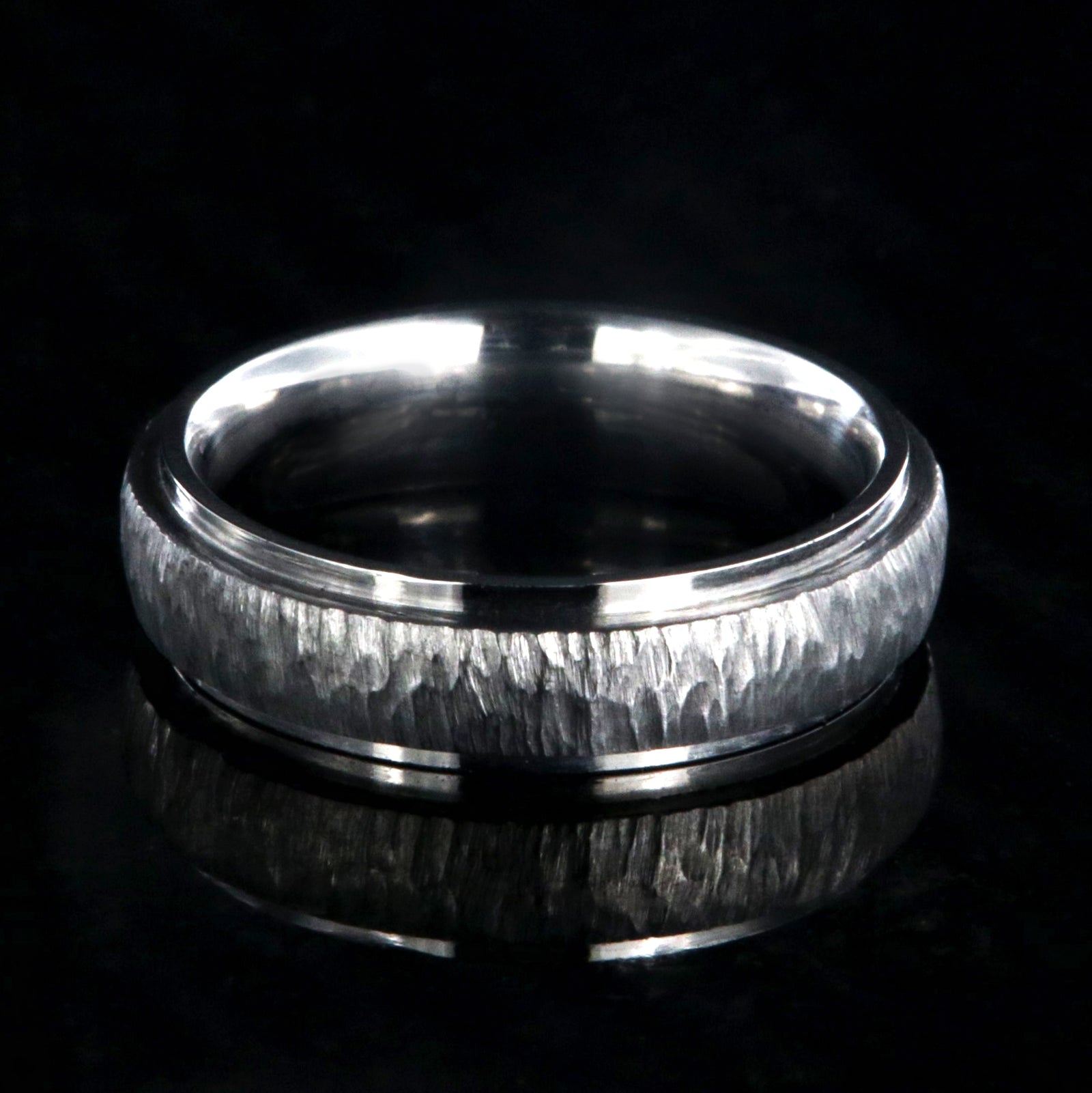 5mm wide titanium wedding band with a raised center and tree bark finish