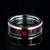 6mm wide titanium ring with pink and black swirl patterned inlay