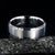 6mm wide titanium wedding band with a raised center
