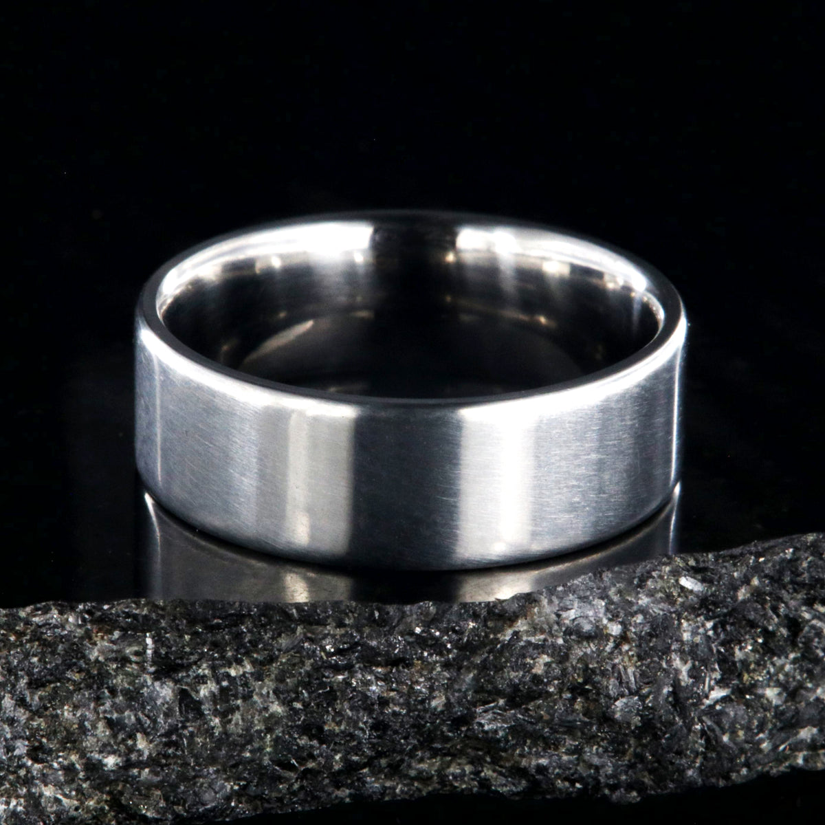 7mm wide titanium wedding band with a flat profile