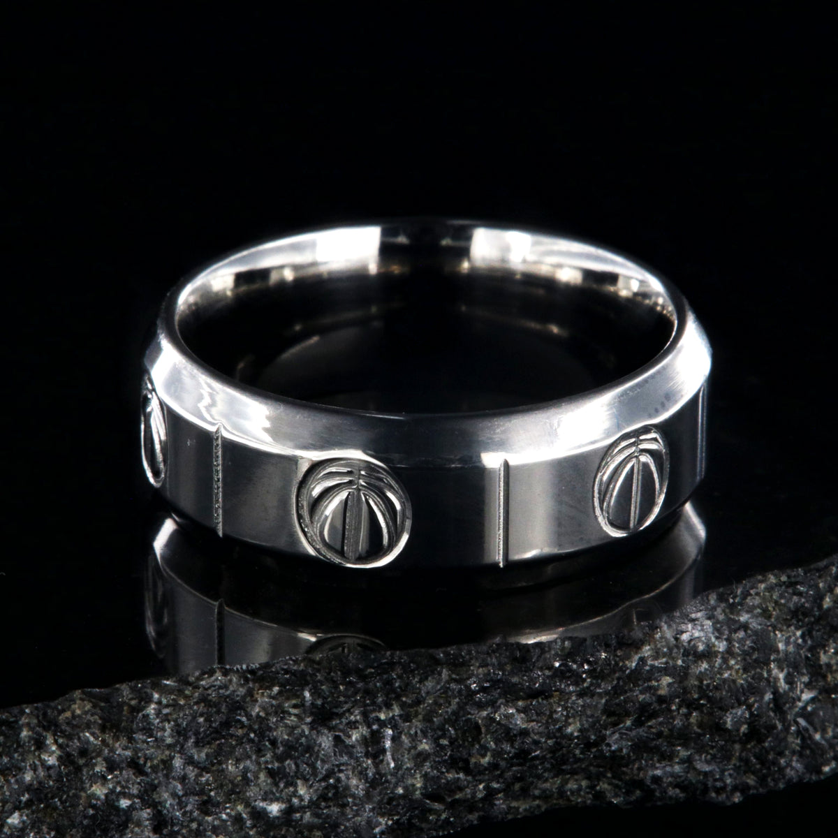 8mm wide titanium basketball ring with beveled edges, milled basketball design, and vertical grooves