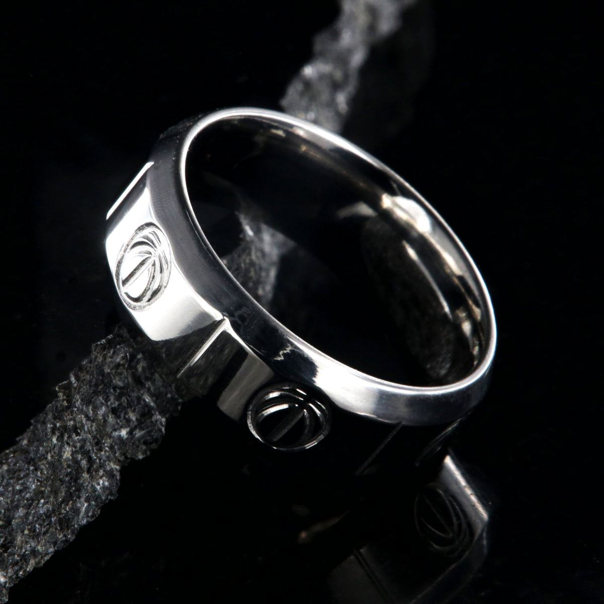 8mm wide titanium basketball ring with beveled edges, milled basketball design, and vertical grooves