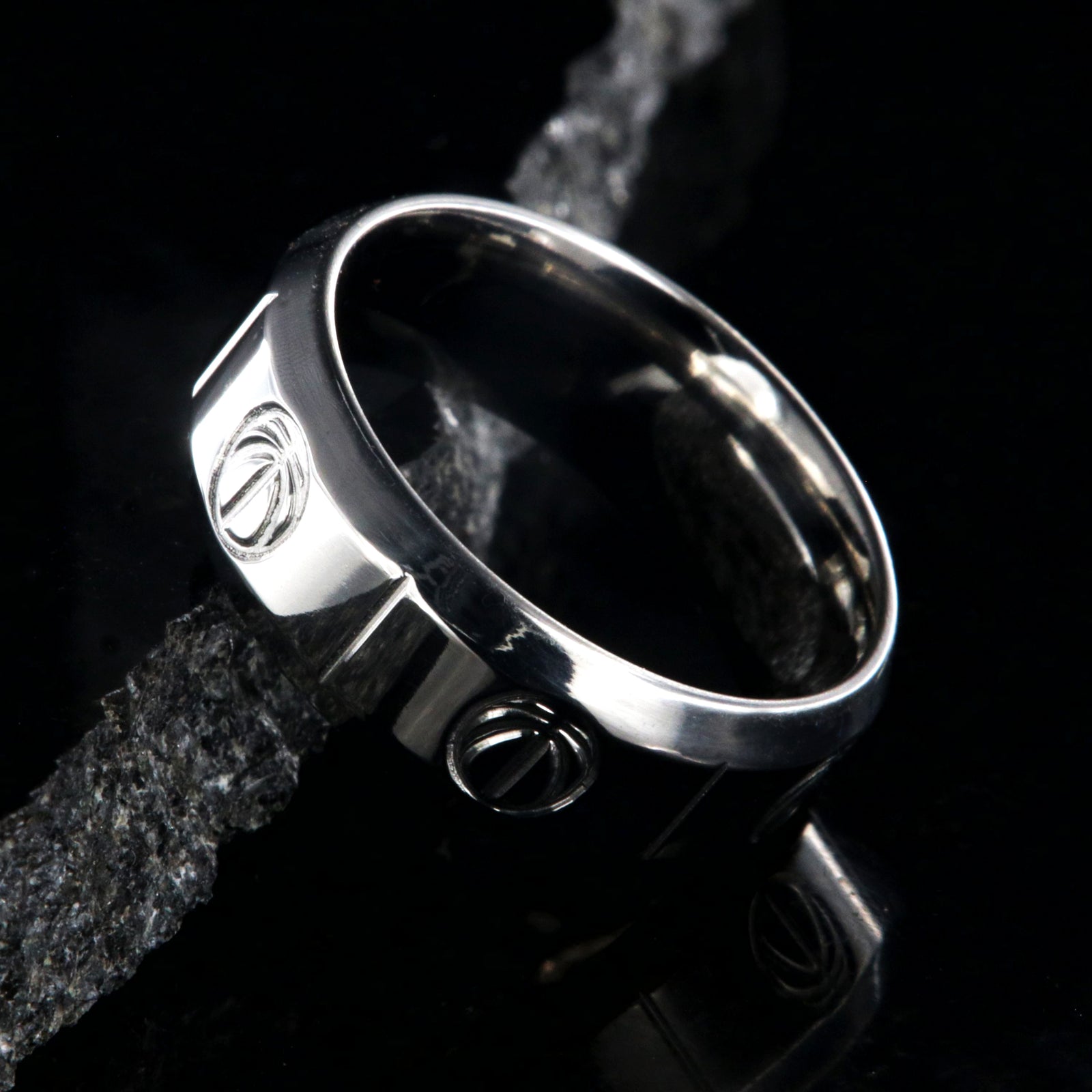 8mm wide titanium basketball ring with beveled edges, milled basketball design, and vertical grooves