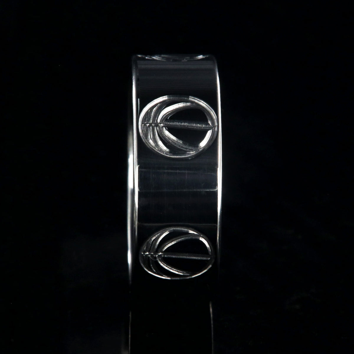 8mm wide titanium volleyball ring with a milled volleyball design