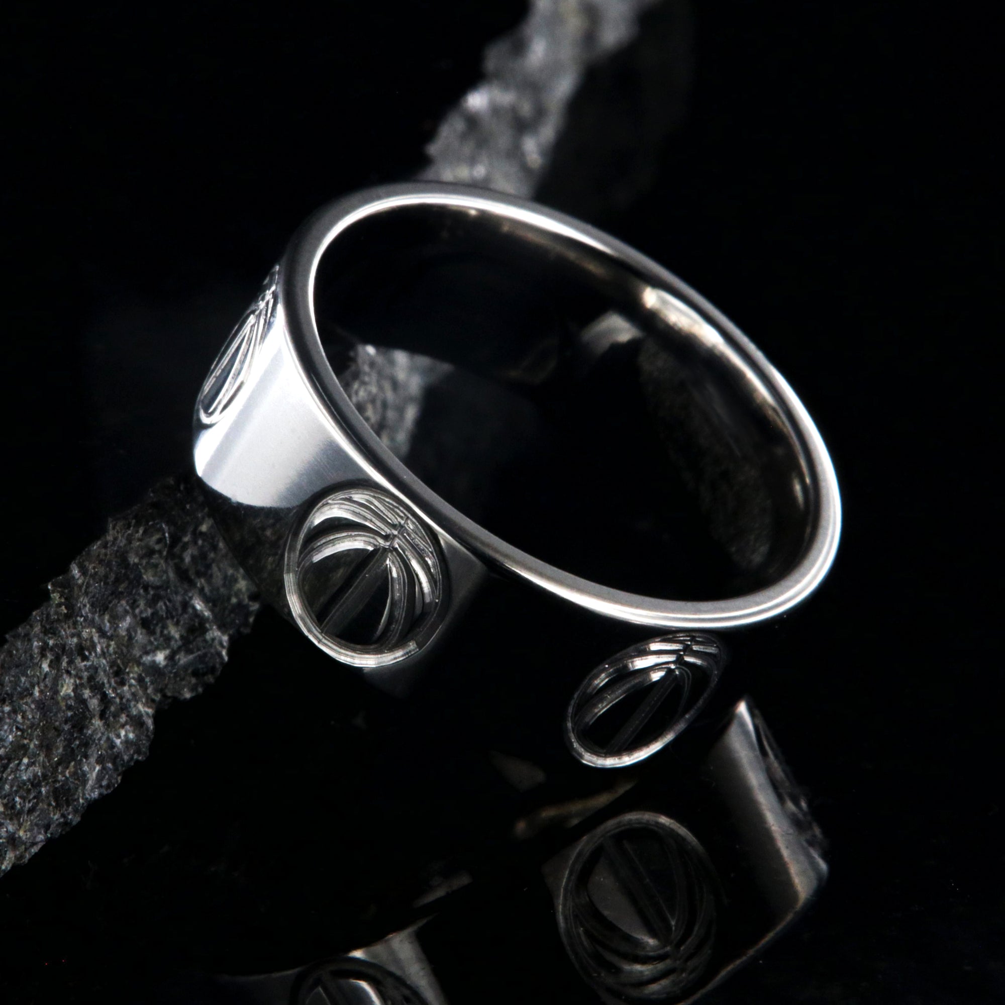 8mm wide titanium volleyball ring with a milled volleyball design
