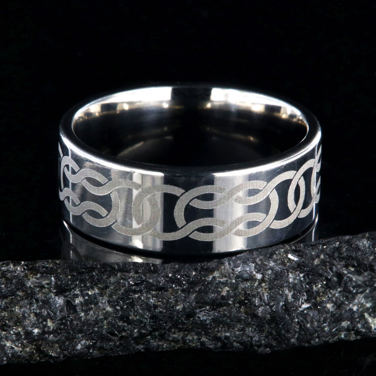 8mm wide titanium ring with Celtic knot design