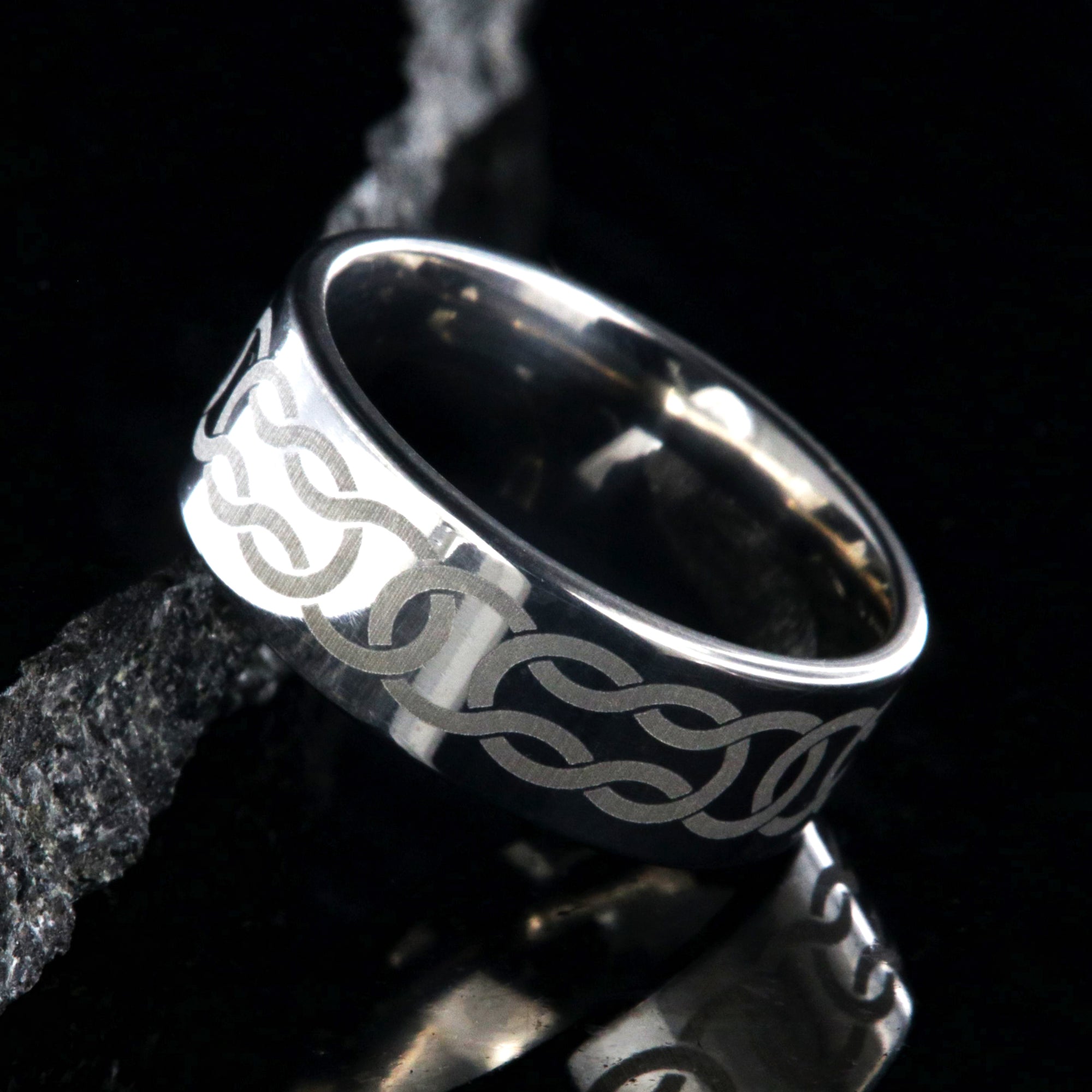 8mm wide titanium ring with Celtic knot design