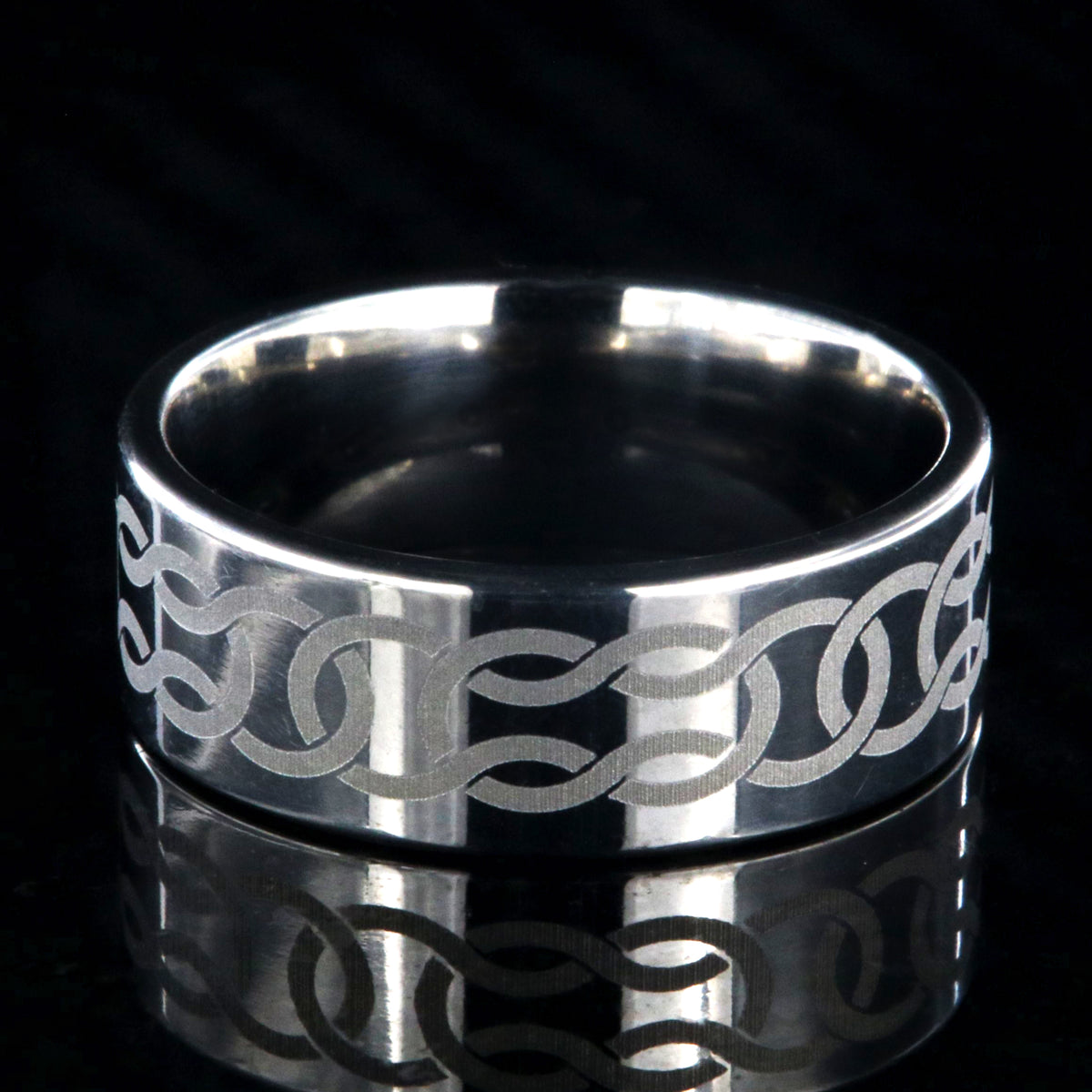 8mm wide titanium ring with Celtic knot design