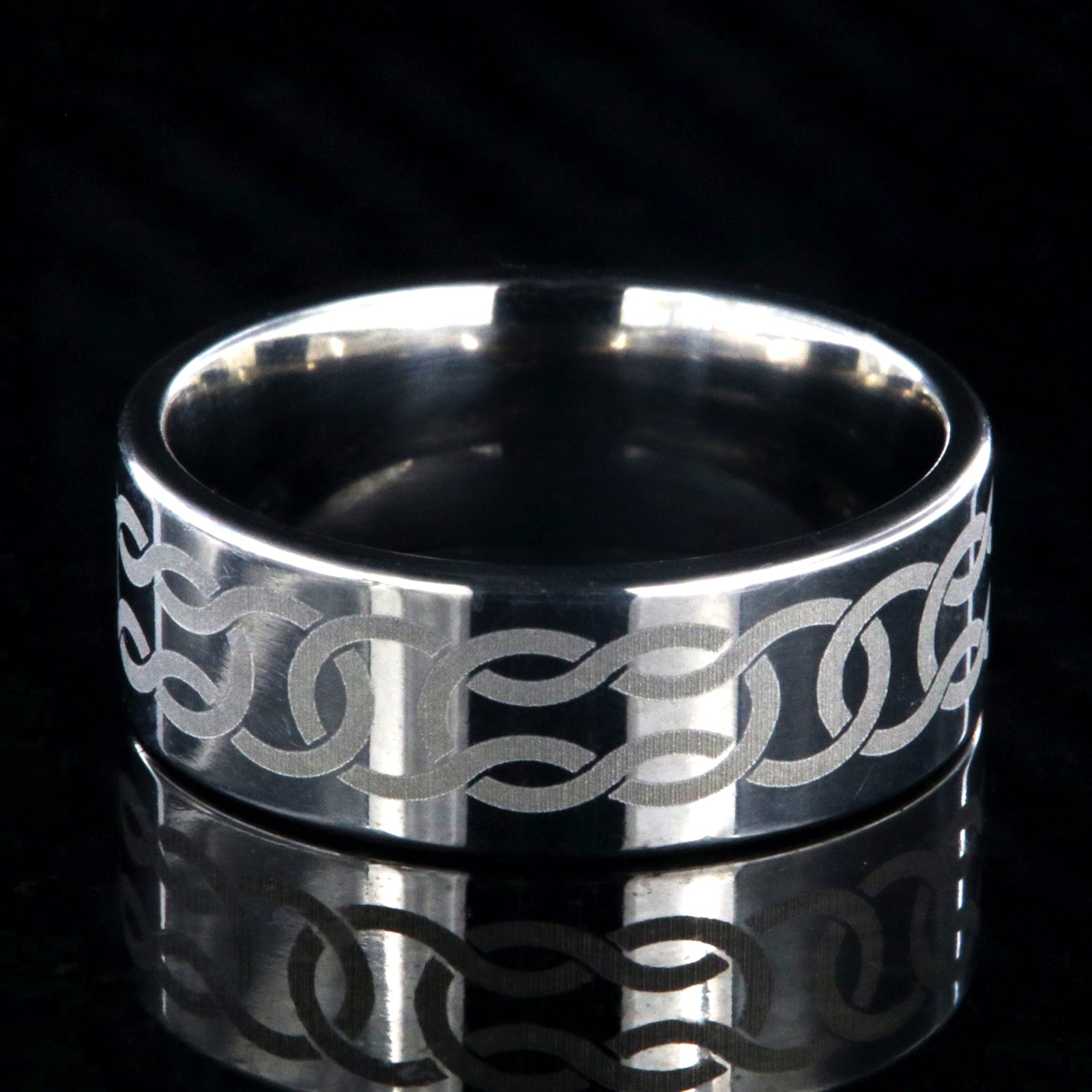 8mm wide titanium ring with Celtic knot design