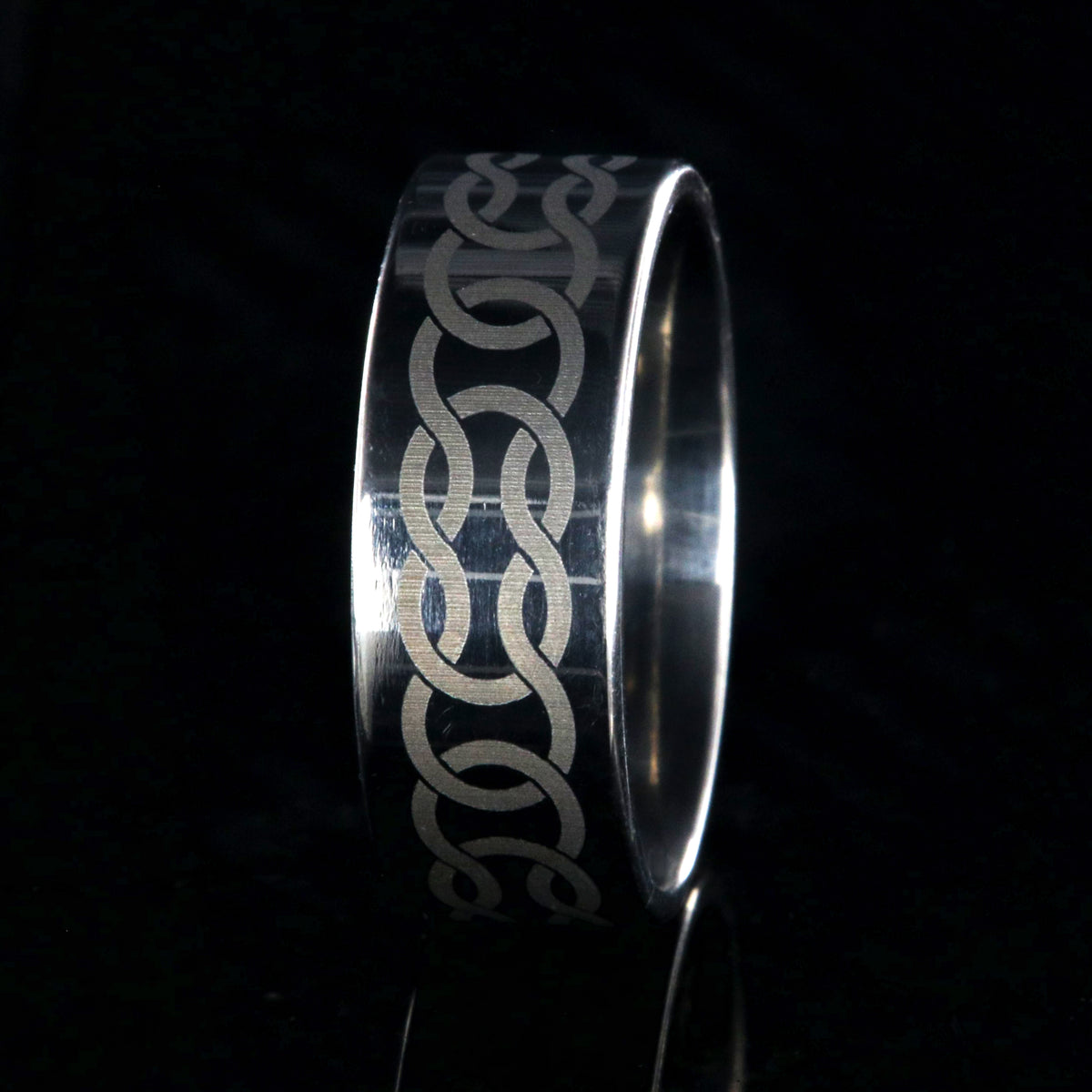 8mm wide titanium ring with Celtic knot design