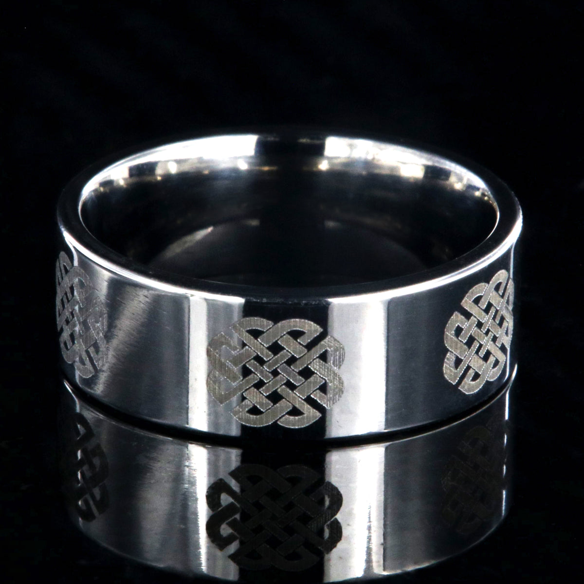 8mm wide titanium ring with Celtic love knot and flat profile