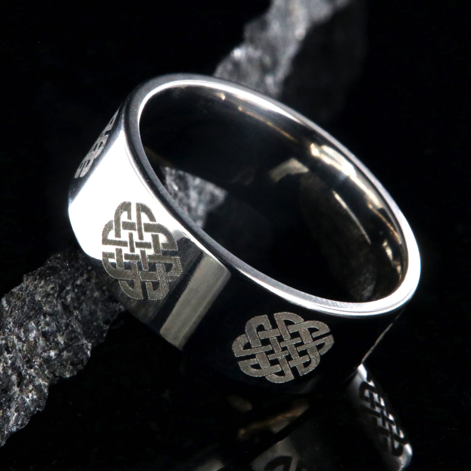 8mm wide titanium ring with Celtic love knot and flat profile