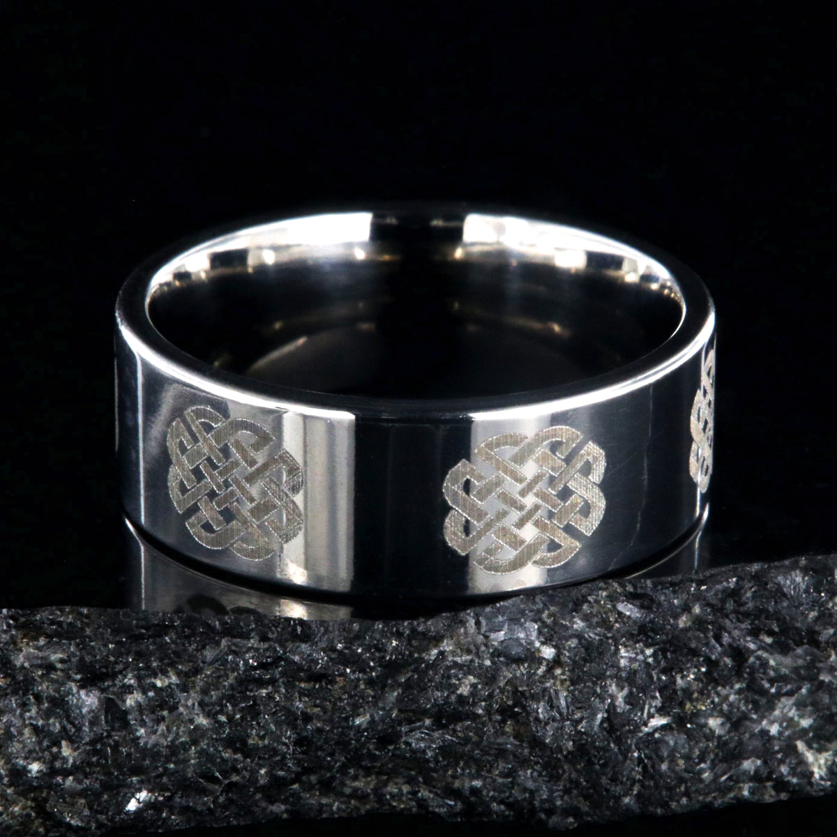 8mm wide titanium ring with Celtic love knot and flat profile