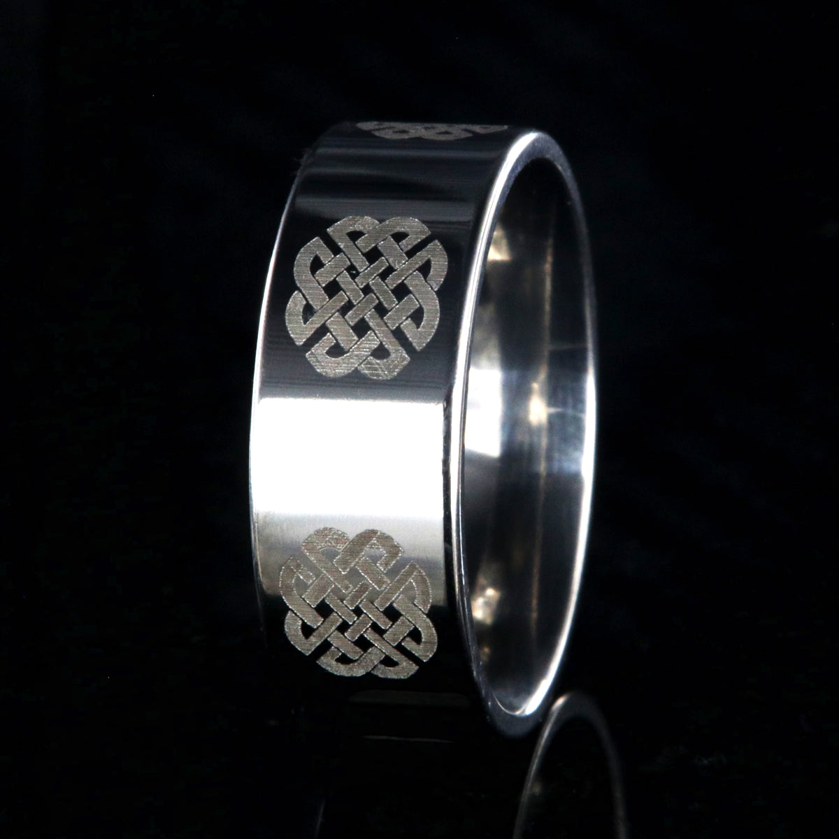 8mm wide titanium ring with Celtic love knot and flat profile