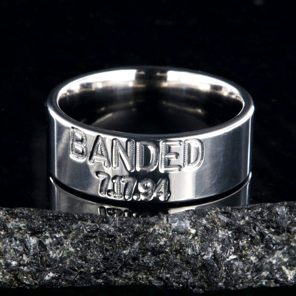 8mm wide titanium duck band wedding ring with 2 lines of text
