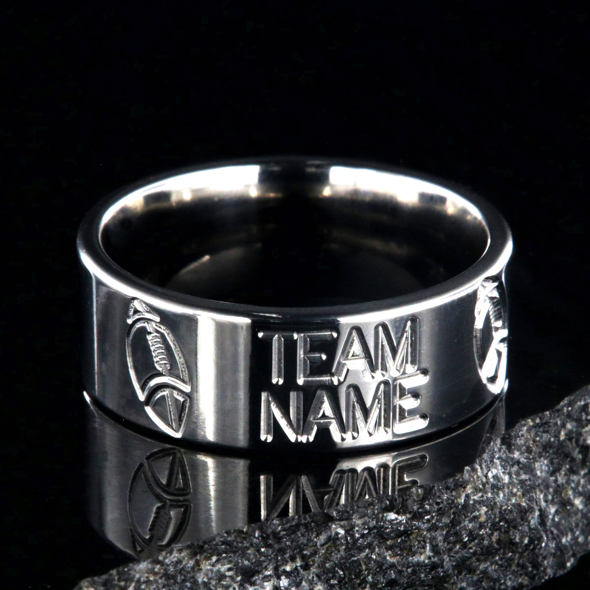 8mm wide titanium football ring with milled footballs and a custom team name