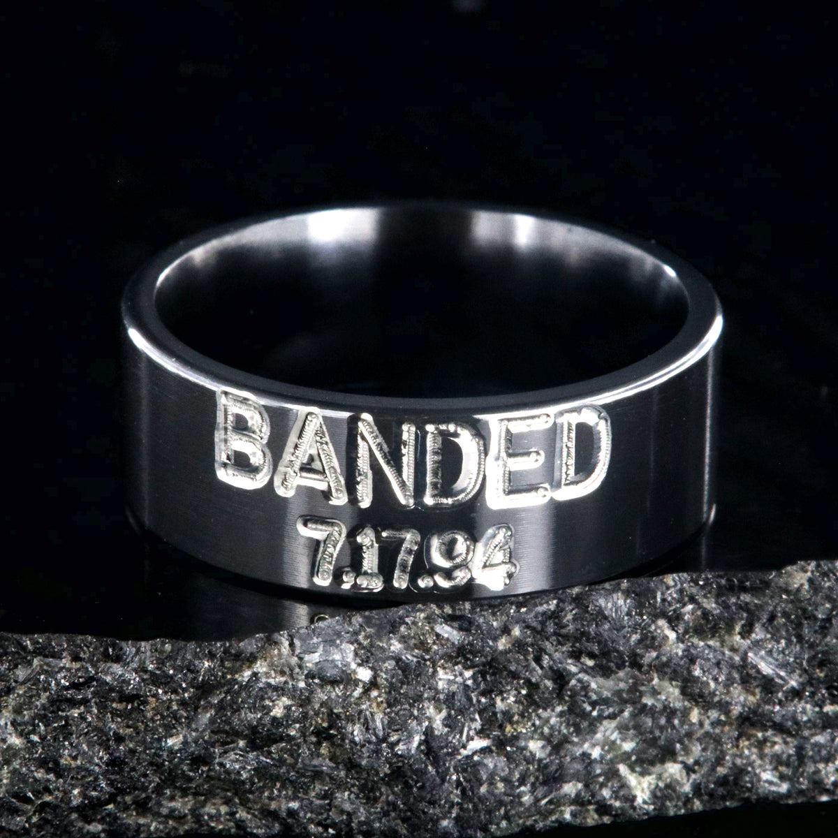 8mm wide black zirconium duck band ring with 2 lines two-tone colored text