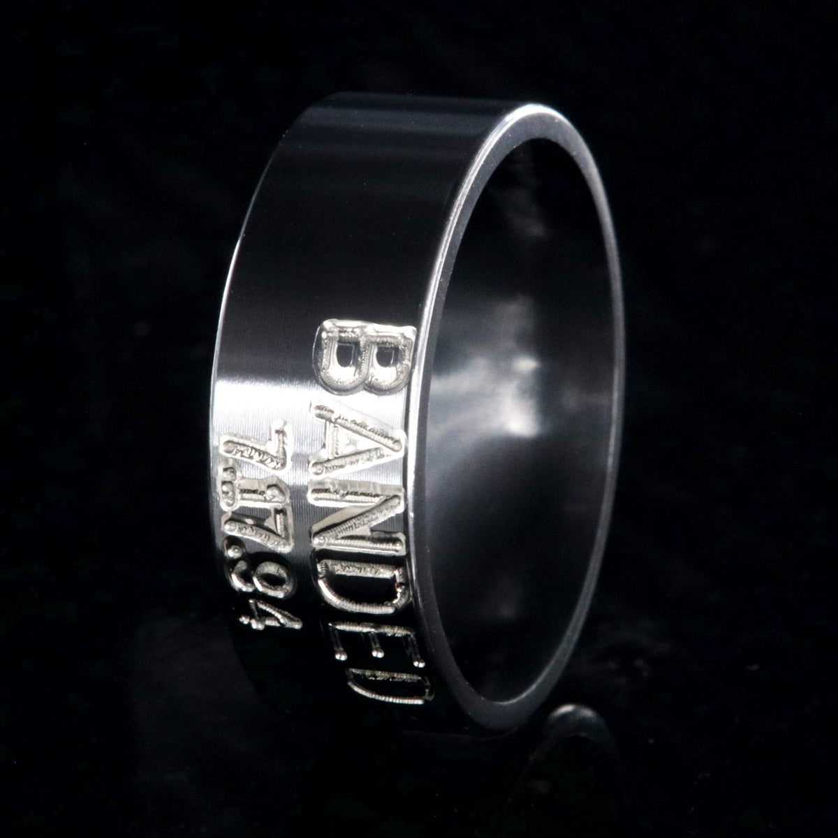 8mm wide black zirconium duck band ring with 2 lines two-tone colored text