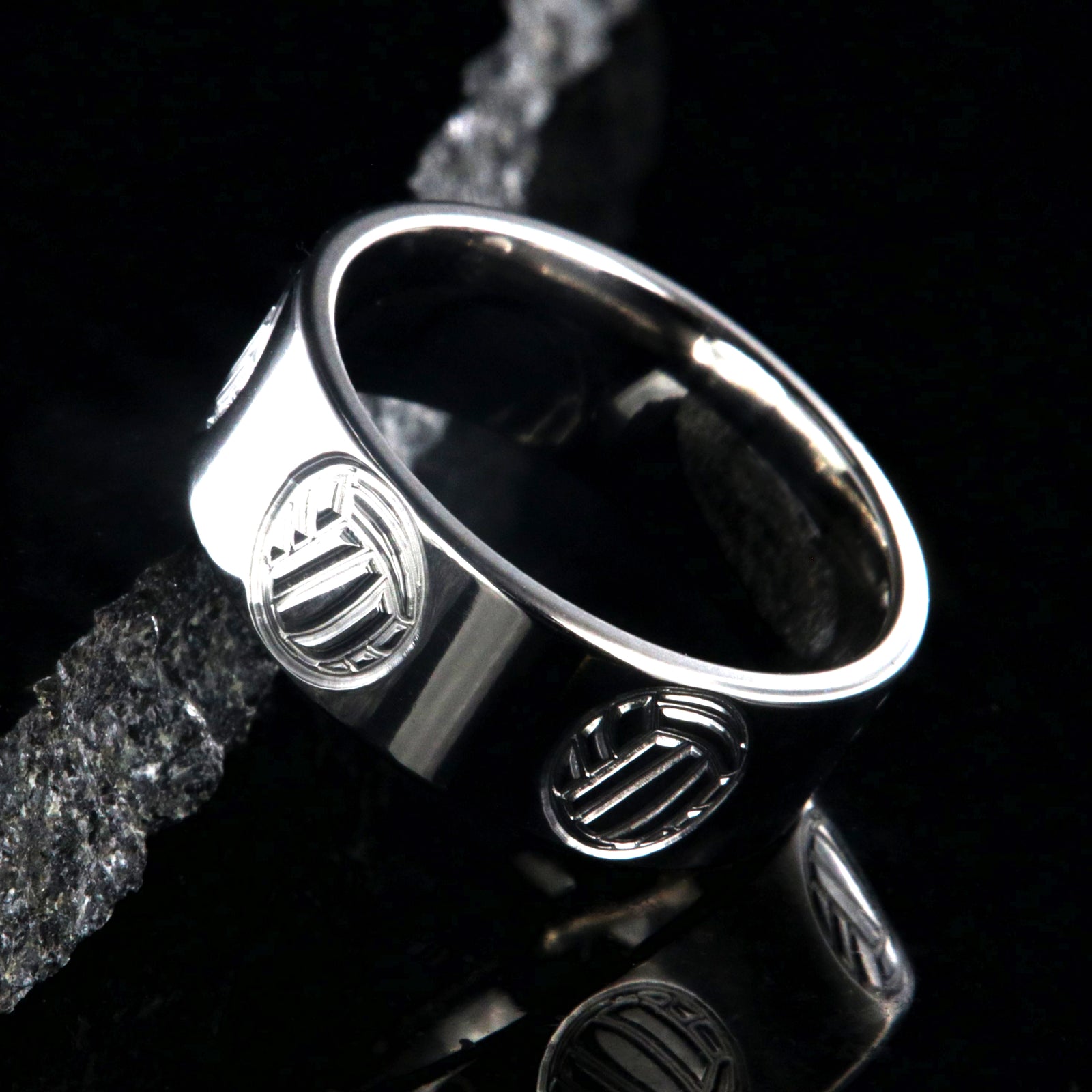 8mm wide titanium ring with milled volleyball design and flat profile