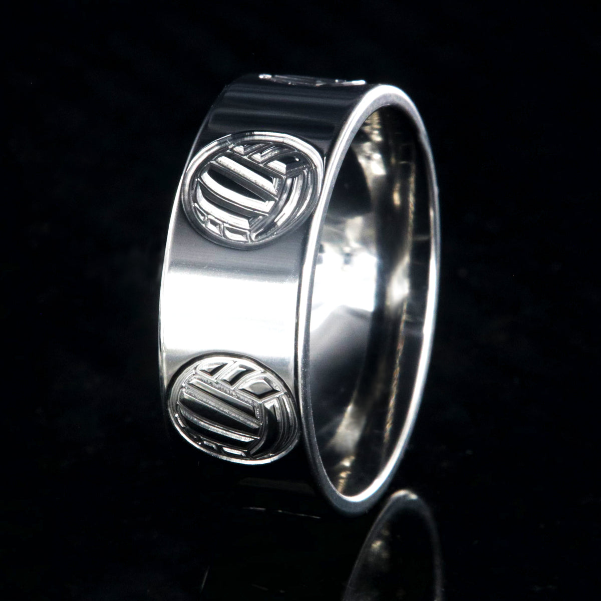 8mm wide titanium ring with milled volleyball design and flat profile