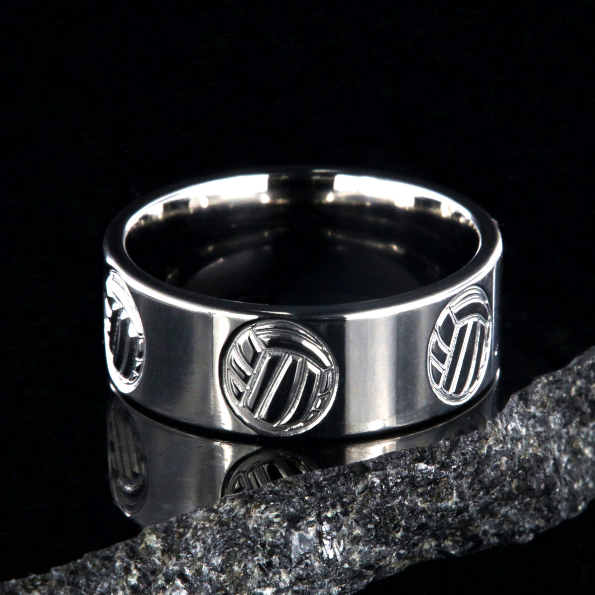 8mm wide titanium ring with milled volleyball design and flat profile