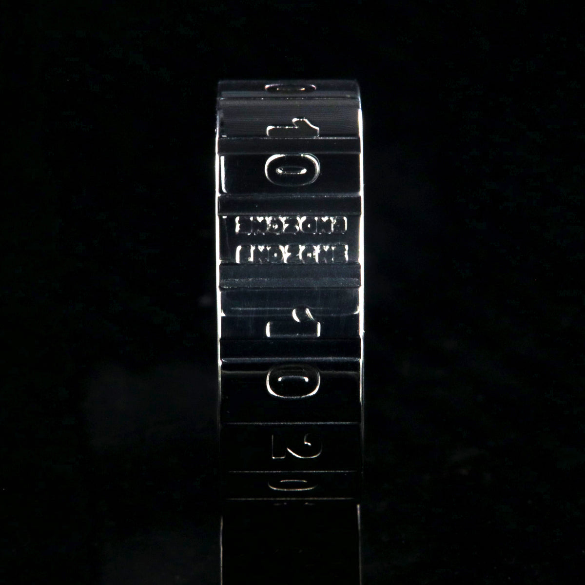 8mm wide titanium football ring with a yardage design