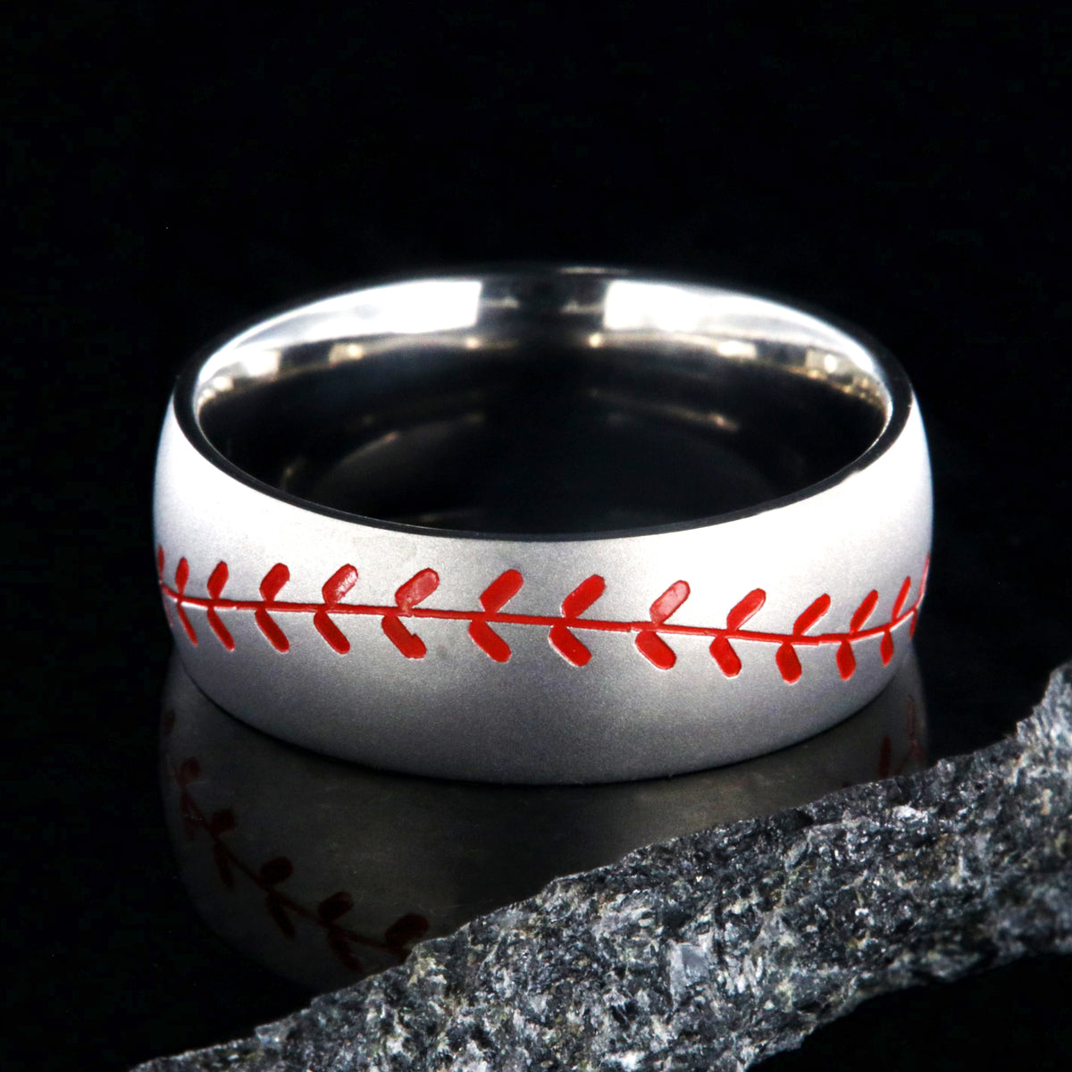 8mm wide titanium baseball ring with red stitching and a brushed finish