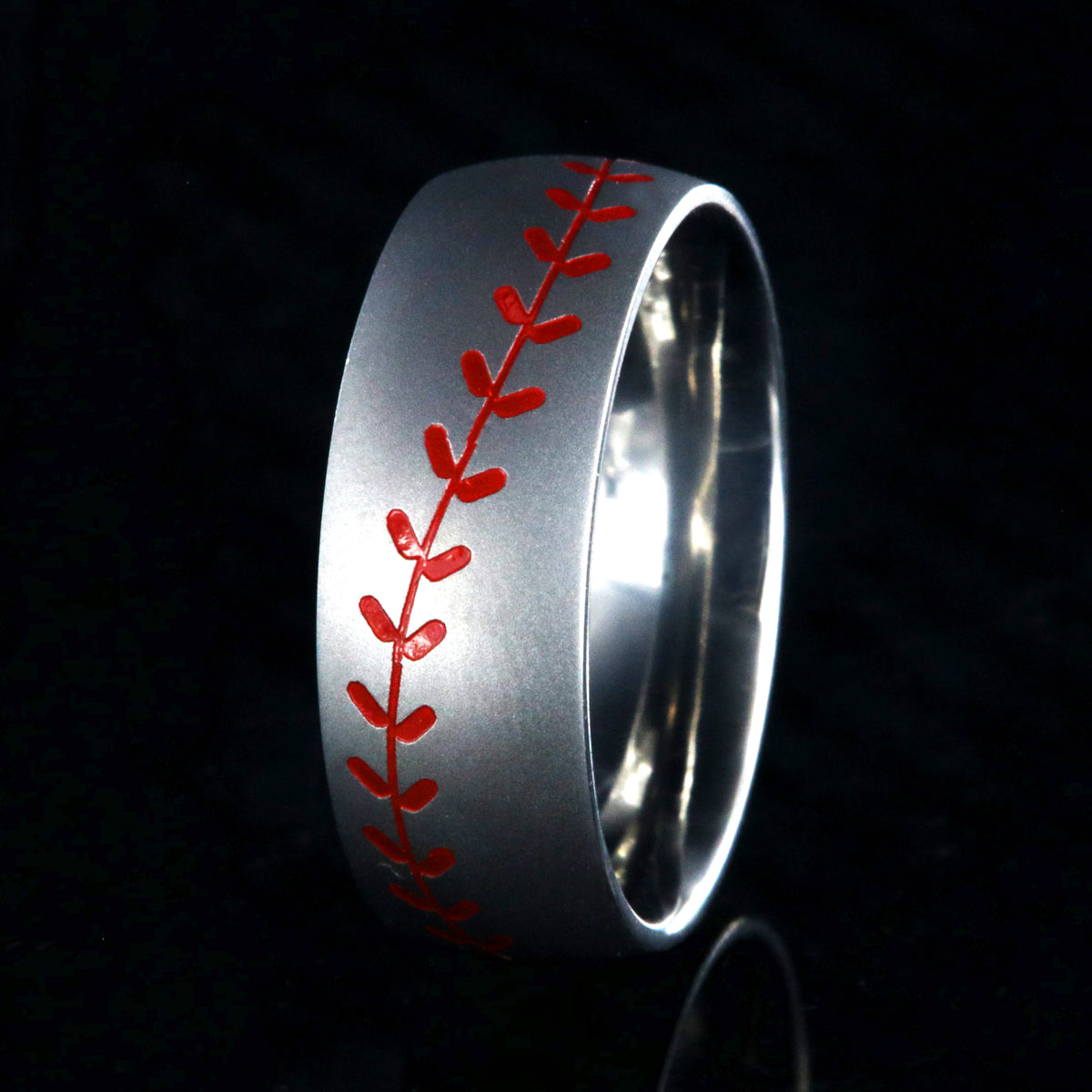 8mm wide titanium baseball ring with red stitching and a brushed finish