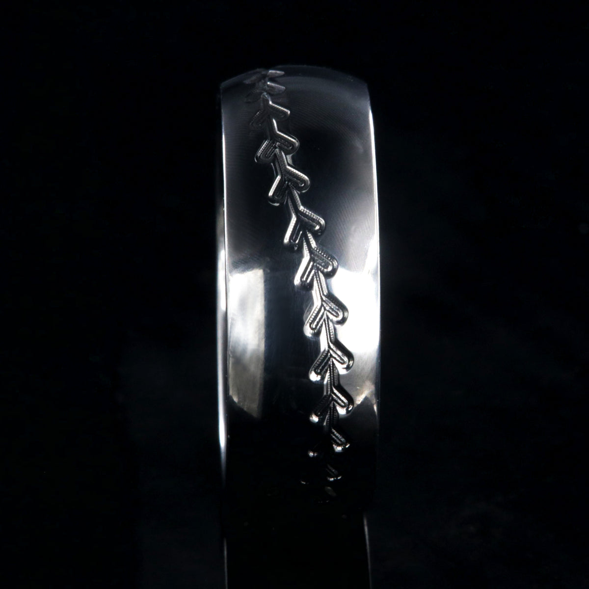 8mm wide titanium baseball ring with milled stitching and a rounded profile