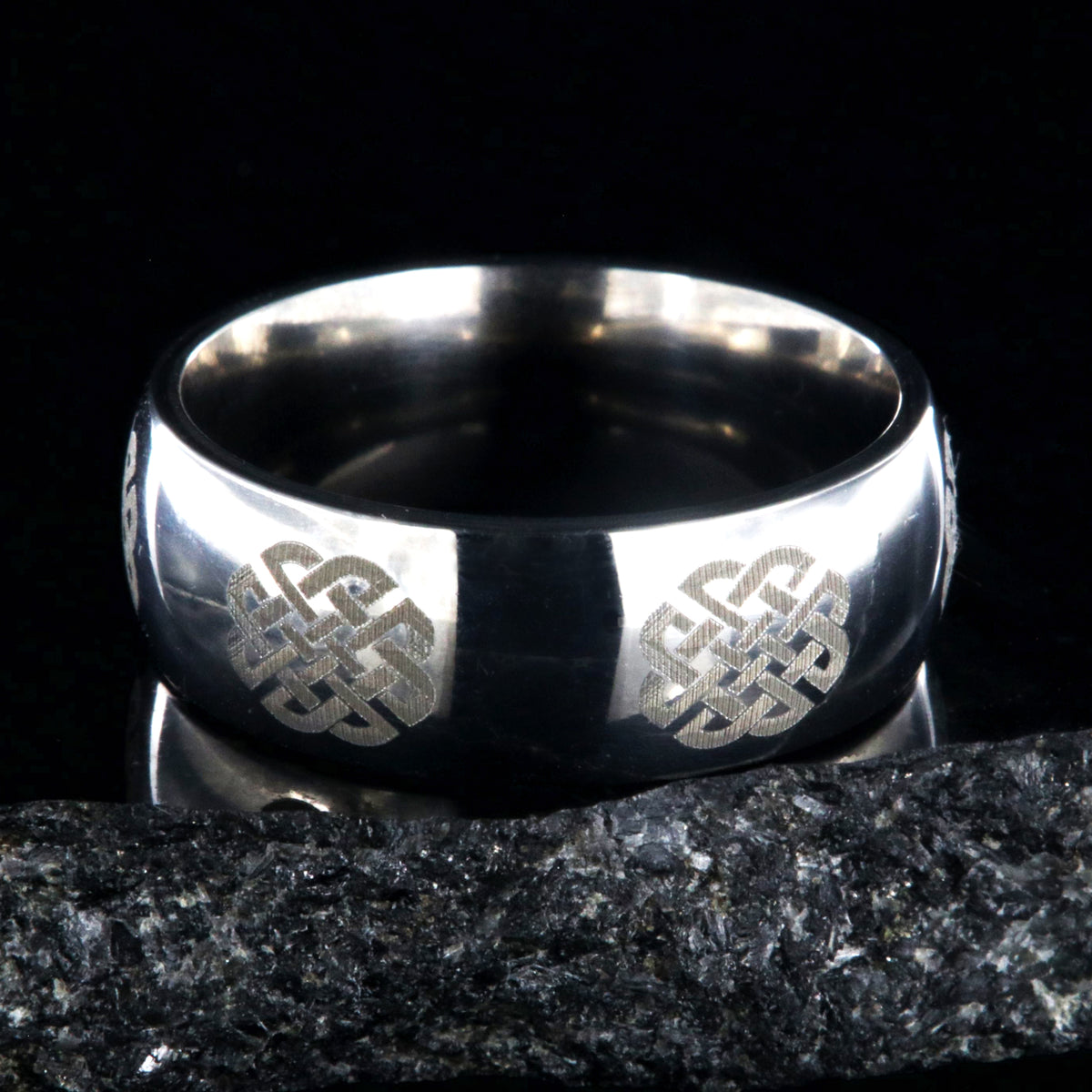 8mm wide titanium ring with Celtic knot design