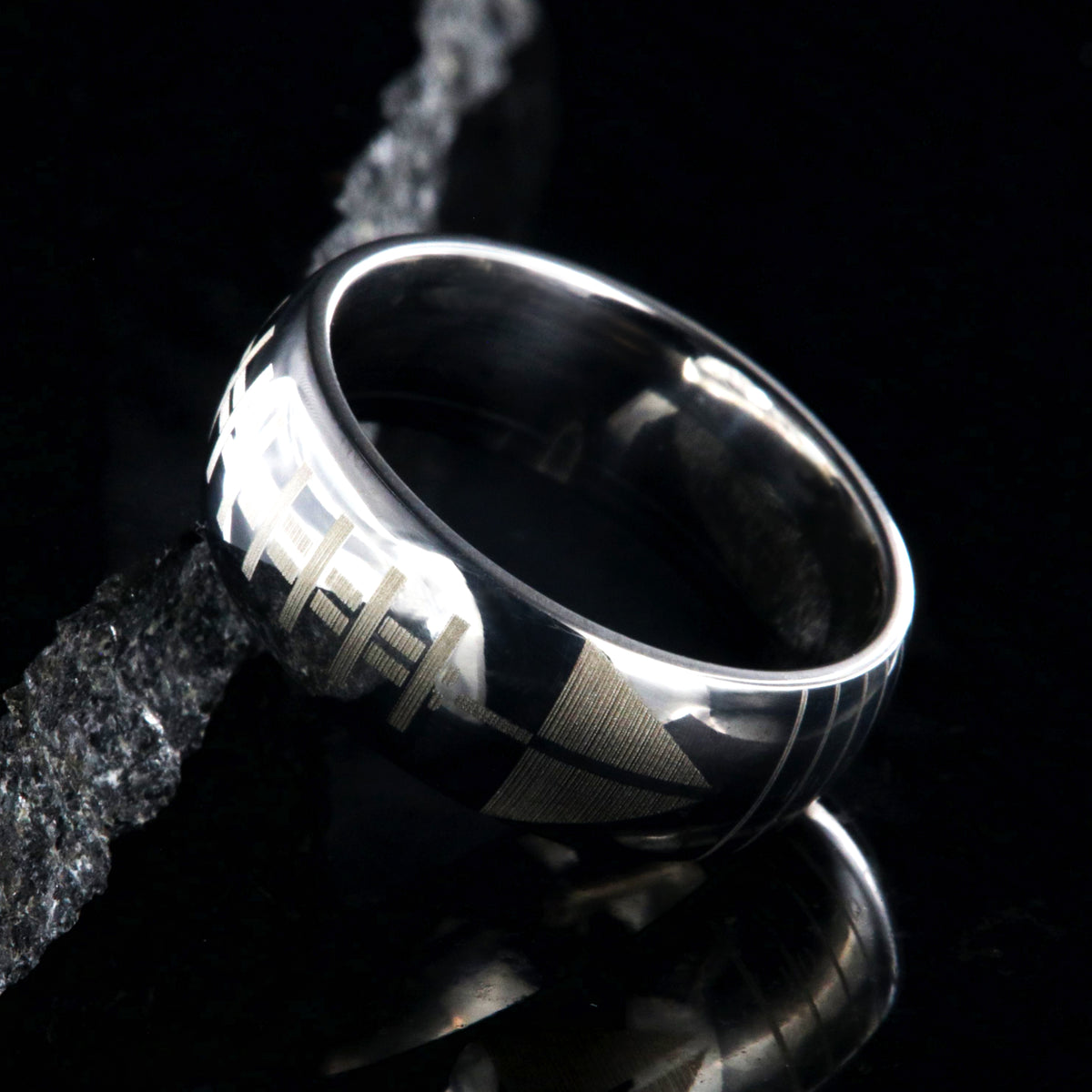 8mm wide titanium football ring with layered football design 