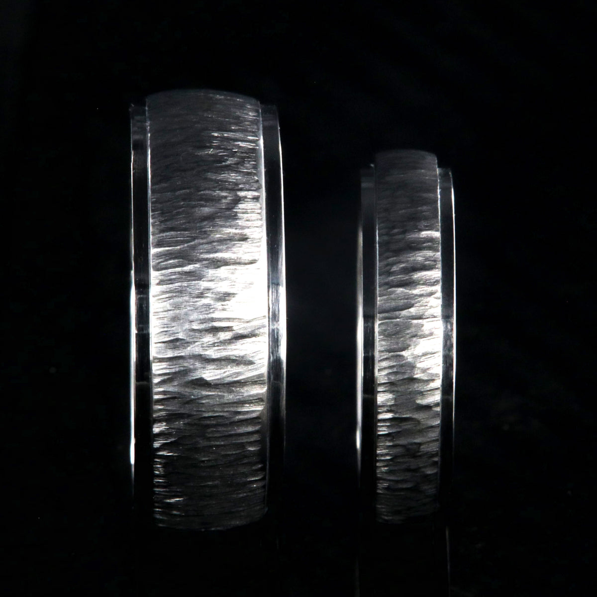 8mm and 5mm wide matching titanium wedding bands with a tree bark raised center