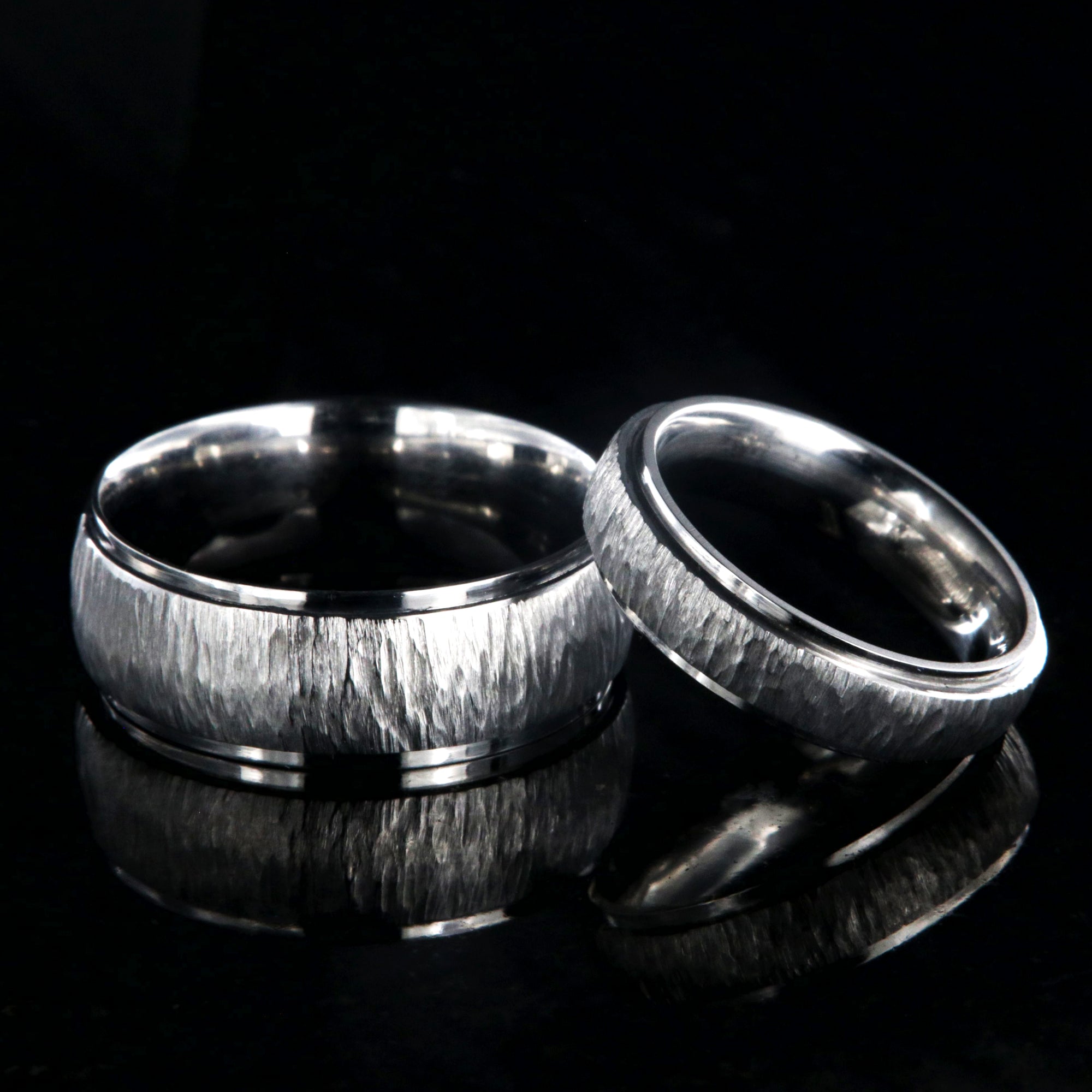8mm and 5mm wide matching titanium wedding bands with a tree bark raised center